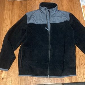 Place black and grey fleece jacket